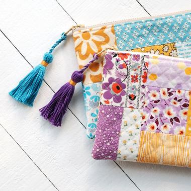 https://cdn-0.sewingwithscraps.com/ezoimgfmt/kpdccb.a2cdn1.secureserver.net/wp-content/uploads/2020/04/QuiltedTasselPouch3.jpg?ezimgfmt=rs:380x380/rscb2/ngcb2/notWebP